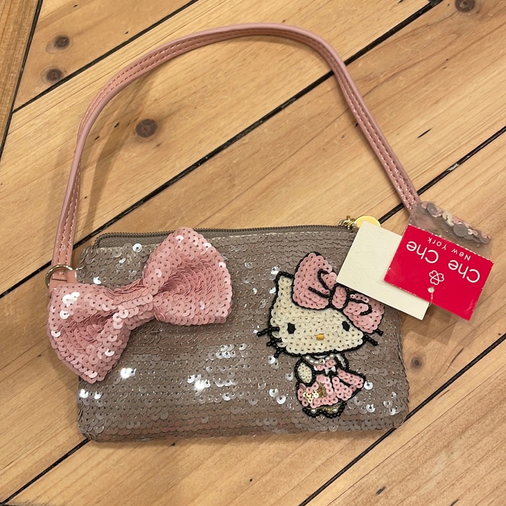 Vintage 2011 New hello kitty Che Che Wristlet.